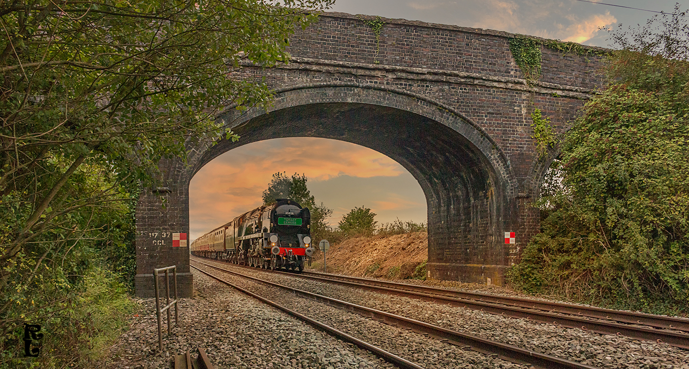 Alford Sunset - train about to go under a bridge