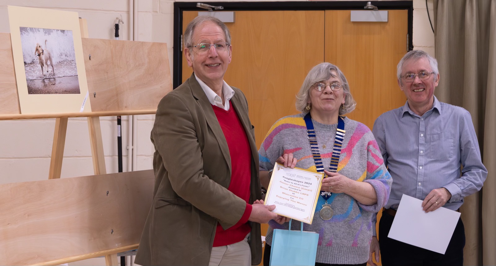 Brian Stubbs being given one of the Knightshayes awards by Helen Jones