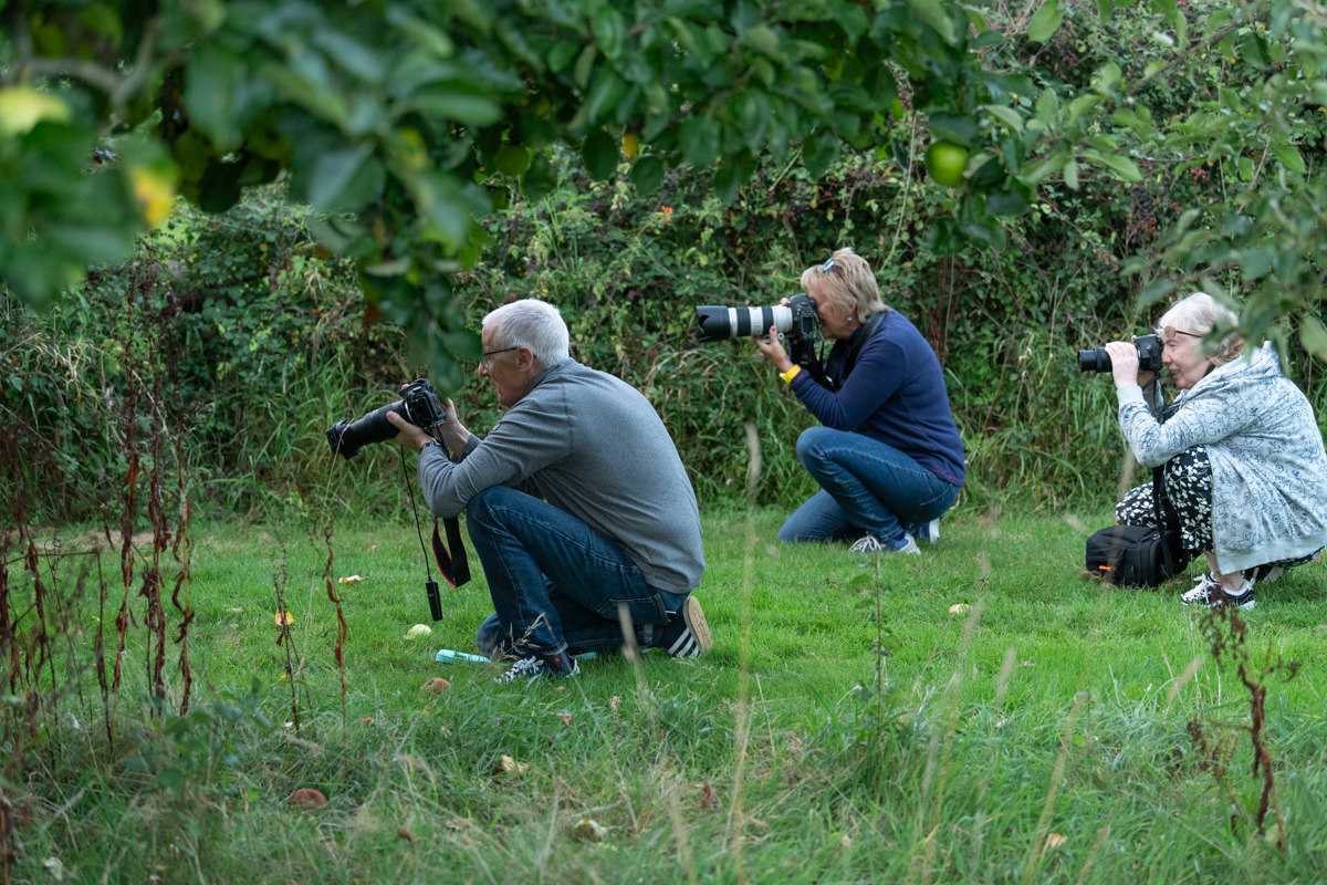 Three keen members in position